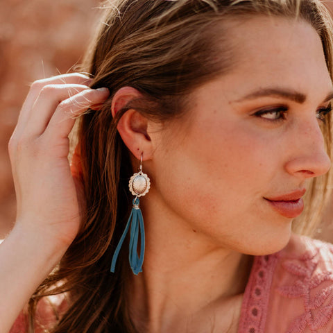 Silver concho earrings with leather tassel